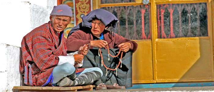 Old men with beads Bhutan